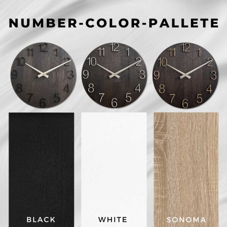 Modern faóra egyszerű számlappal és fém mutatókkal.