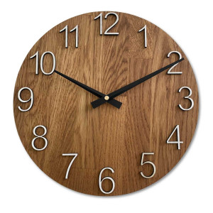 Kör alakú, fából készült falióra finom természetes motívummal. 2